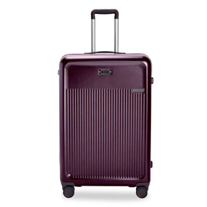 Briggs & Riley Sympatico large expandable plum checked luggage with spinner wheels and sturdy handle, designed for travel.