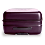 Briggs & Riley Sympatico large expandable plum checked luggage with spinner wheels and durable hard shell exterior.