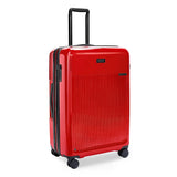Briggs & Riley Sympatico large expandable spinner checked luggage in glossy ruby red with four wheels and a sleek finish.