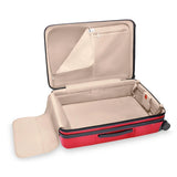 Briggs & Riley Sympatico large expandable spinner checked luggage in glossy ruby with four wheels and a sleek design.