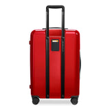 Briggs & Riley Sympatico medium expandable spinner checked luggage in glossy ruby with four wheels and a sleek exterior.