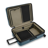 Briggs & Riley ZDX medium 27-inch ocean blue hardside expandable spinner checked luggage with four wheels and TSA lock.