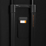 Briggs & Riley ZDX medium expandable spinner checked luggage with ocean blue hard shell and four spinner wheels.