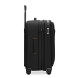 Briggs & Riley ZDX medium expandable checked luggage spinner with ocean blue hard shell and four wheels for easy travel.