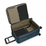 Briggs & Riley ZDX medium expandable spinner checked luggage in ocean blue with four wheels and modern design.