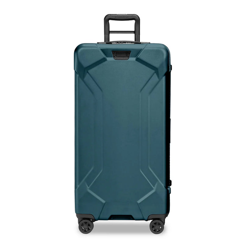 Briggs & Riley Torq extra large checked luggage trunk spinner with front view, durable hard shell and four spinner wheels.