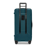 Briggs & Riley Torq extra large checked luggage trunk spinner with durable hard shell and four-wheel spinner for easy mobility.