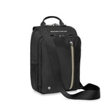 Briggs & Riley HTA crossbody bag with adjustable strap and multiple compartments, made of durable black material.