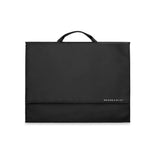 Briggs & Riley garment folder neatly folded with clothing inside, designed for wrinkle-free travel organization.