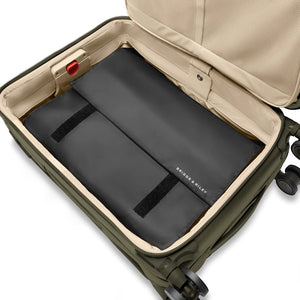 Briggs & Riley garment folder for wrinkle-free travel, featuring a sleek design and sturdy construction for organizing clothing.