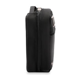 Briggs & Riley Tech Kit with multiple compartments and zipper closures for organizing electronic accessories and cables.