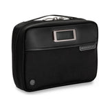 Briggs & Riley Tech Kit with organized compartments, black nylon exterior, and zipper closure for electronic accessories.