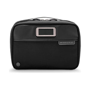 Briggs & Riley Tech Kit with multiple compartments and zipper closures, designed for organizing electronic accessories and cables.