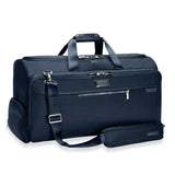 Briggs & Riley Baseline Garment Duffle bag shown from an angled view, featuring durable fabric and a sleek, structured design.