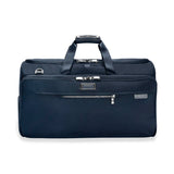 Briggs & Riley Baseline garment duffel bag with front zipper pocket and sturdy handles, designed for travel and garment storage.