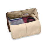 Interior view of Briggs & Riley Baseline Garment Duffle in limited edition chocolate, showcasing organized compartments and durable fabric.