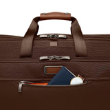 Briggs & Riley Baseline Garment Duffle in limited edition chocolate, showing the stylish duffel bag with handles and zipper details.