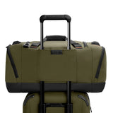 Briggs & Riley ZDX large travel duffel bag in black with padded handles and spacious main compartment.