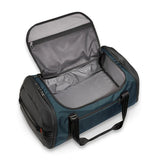 Briggs & Riley ZDX large travel duffle bag with sturdy handles and spacious compartments, shown in black fabric.