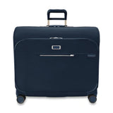 Briggs & Riley Baseline Deluxe Wardrobe Spinner garment bag with multiple compartments and sturdy wheels for travel.