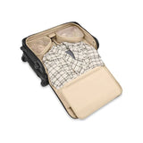 Briggs & Riley Baseline carry-on upright garment bag with wheels, durable fabric, and multiple compartments for travel organization.