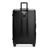 Briggs & Riley Sympatico extra large hardside spinner luggage with four wheels and durable exterior.