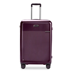Briggs & Riley Sympatico medium expandable plum hardside spinner luggage with four wheels and TSA lock.