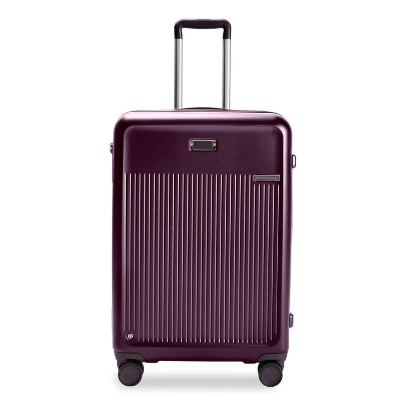 Briggs & Riley Sympatico medium expandable plum hardside spinner luggage with four wheels and TSA lock.