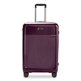 Briggs & Riley Sympatico medium expandable spinner checked luggage in plum with four wheels and hardside design.