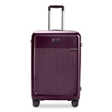 Briggs & Riley Sympatico medium expandable plum hardside spinner luggage with four wheels and TSA lock.