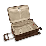 Interior view of Briggs & Riley Baseline Essential Carry-On Spinner in limited edition chocolate color, showing compartments and organization.