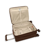 Interior view of Briggs & Riley Baseline Global Carry-On Spinner luggage with chocolate-colored fabric and organized compartments.