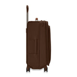 Briggs & Riley Baseline Medium Expandable Spinner luggage in limited edition chocolate, side view showing durable hard shell and wheels.