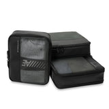 Briggs & Riley carry-on compression packing cubes set for efficient travel organization, shown in black with zippers and mesh panels.