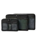 Briggs & Riley carry-on compression packing cubes set for travel organization, showing multiple organized cubes in a travel bag.