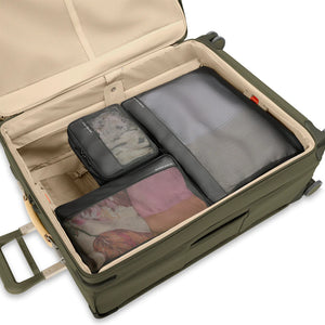 Briggs & Riley check-in packing cube set with multiple organized compartments for efficient travel packing.