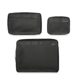 Briggs & Riley check-in packing cube set with four organized, mesh-covered cubes for travel packing and organization.