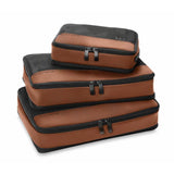 Briggs & Riley carry-on compression packing cubes set for travel organization, showing two black zippered cubes with handles.