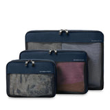Briggs & Riley check-in packing cube set with multiple organized compartments for efficient travel packing.