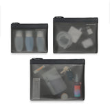 Briggs & Riley translucent packing pouch set with four clear organization bags for travel and storage.