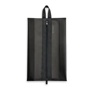 Briggs & Riley translucent shoe pouch for packing organization, showing clear plastic material and zip closure for travel storage.