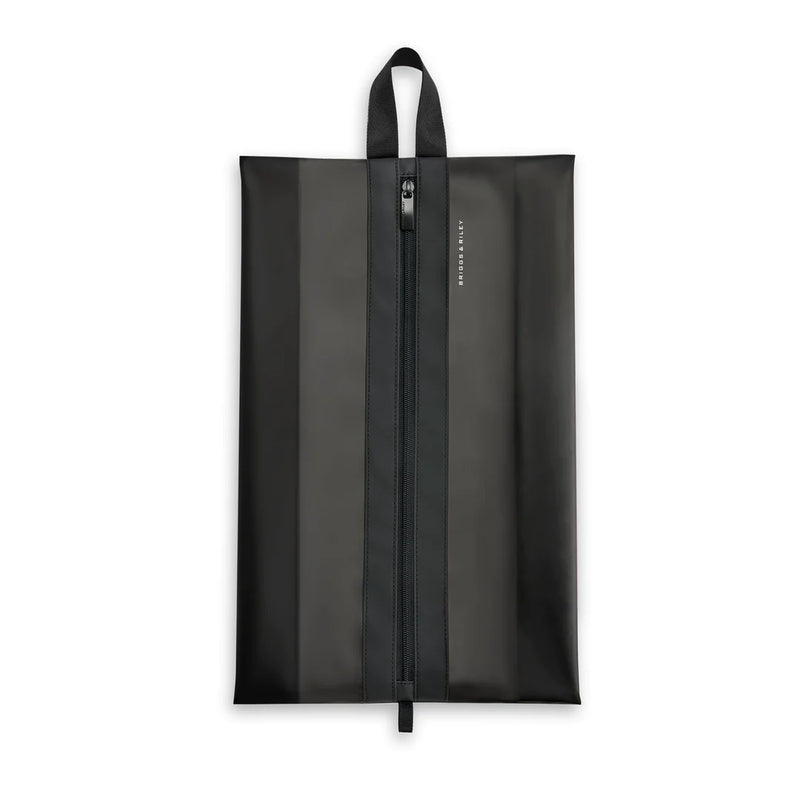 Briggs & Riley translucent shoe pouch for packing organization, showing clear plastic material and zip closure for travel storage.