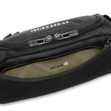 Briggs & Riley HTA sling bag with RFID protection, featuring a compact design and adjustable strap for comfortable carrying.