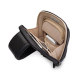 Interior view of Briggs & Riley @work sling bag showing compartments and organizational pockets in a sleek, functional design.
