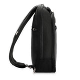 Briggs & Riley @work sling bag shown from the side, compact and stylish with adjustable strap and sleek design.