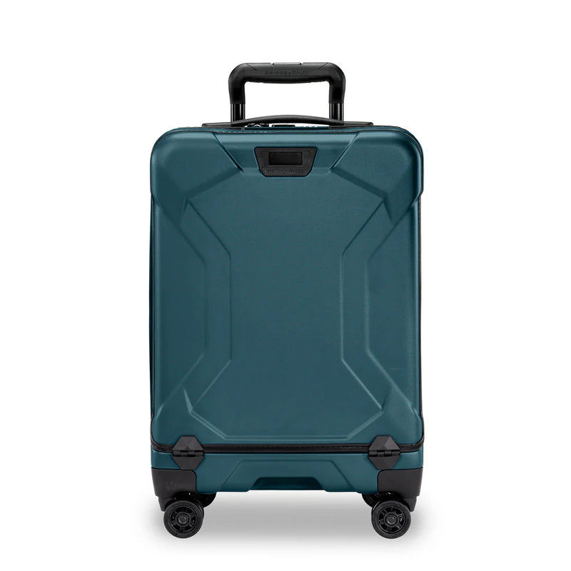 Briggs & Riley Torq domestic carry-on spinner suitcase with front view, durable hard-shell exterior, and four spinner wheels.