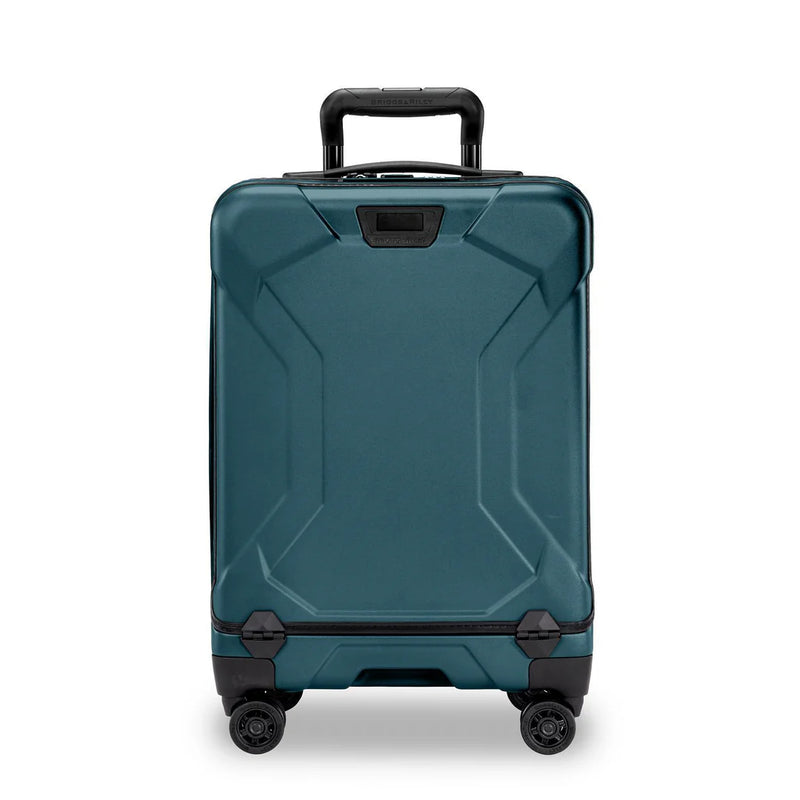 Briggs & Riley Torq international carry-on spinner suitcase with front view showing durable hard shell and 4 spinner wheels.