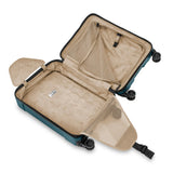 Interior view of Briggs & Riley Torq international carry-on spinner with organized compartments and durable design.