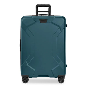 Briggs & Riley Torq medium spinner suitcase in stealth black with four wheels and telescoping handle for easy travel.