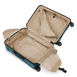 Briggs & Riley Torq medium spinner suitcase in stealth black with four spinning wheels and durable hard shell exterior.